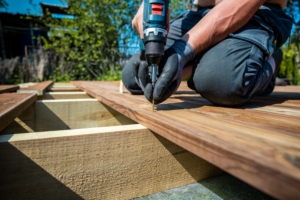 installing a new deck for a home to allow homeowners to be outside without having to leave their property