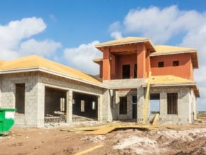 two car garage being built for a home in massachusetts to increase value and convenience