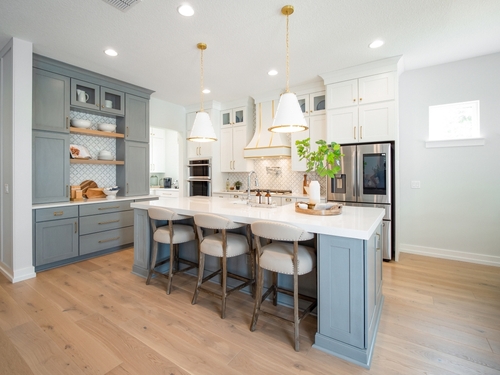 built-in storage in chefs kitchen in home using extra shelves and counters