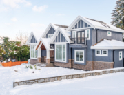 home in winter with james hardie siding for weather and snow protection and insulation to keep home comfortable after being installed by professional