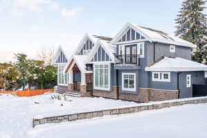 home in winter with james hardie siding for weather and snow protection and insulation to keep home comfortable after being installed by professional