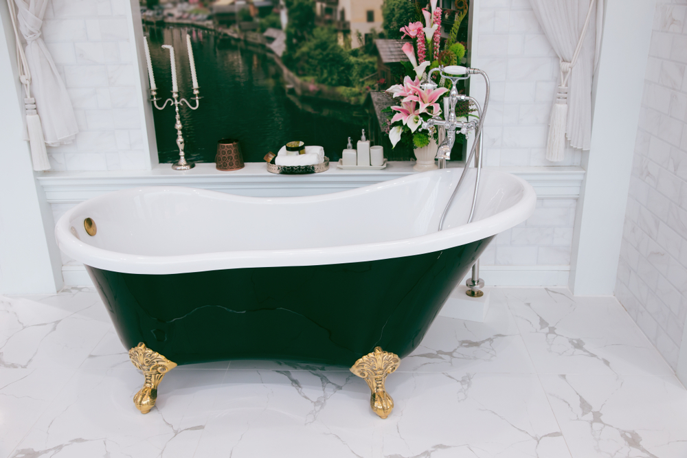 clawfoot tub in a bathroom in a home in massachusetts where homeowners are upgrading for the new year