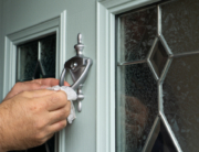 front door of home in massachusetts being replaced to improve home efficiency and overall comfort during the winter season